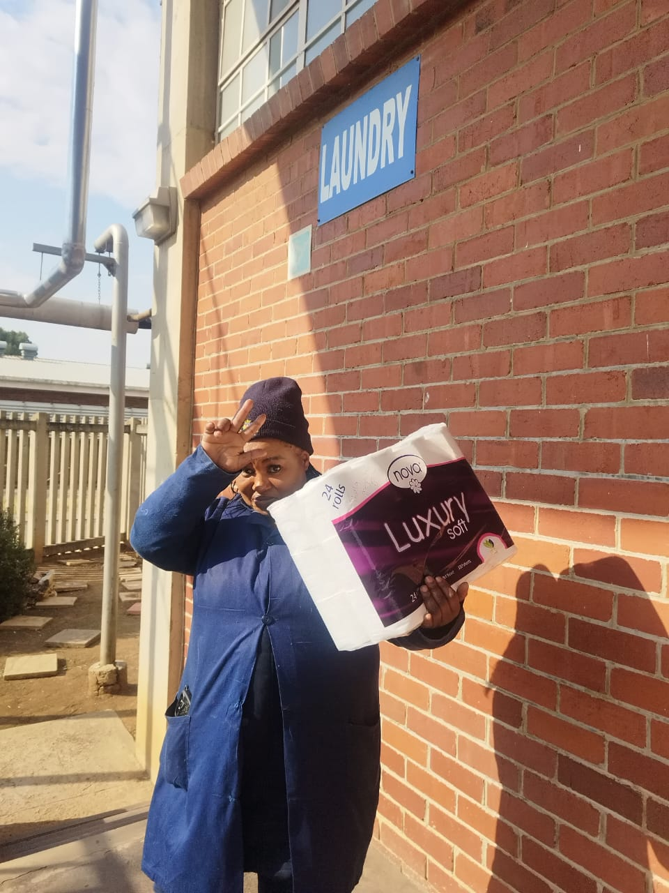 Customer showing off her Mokgadi Enterprise tissue order